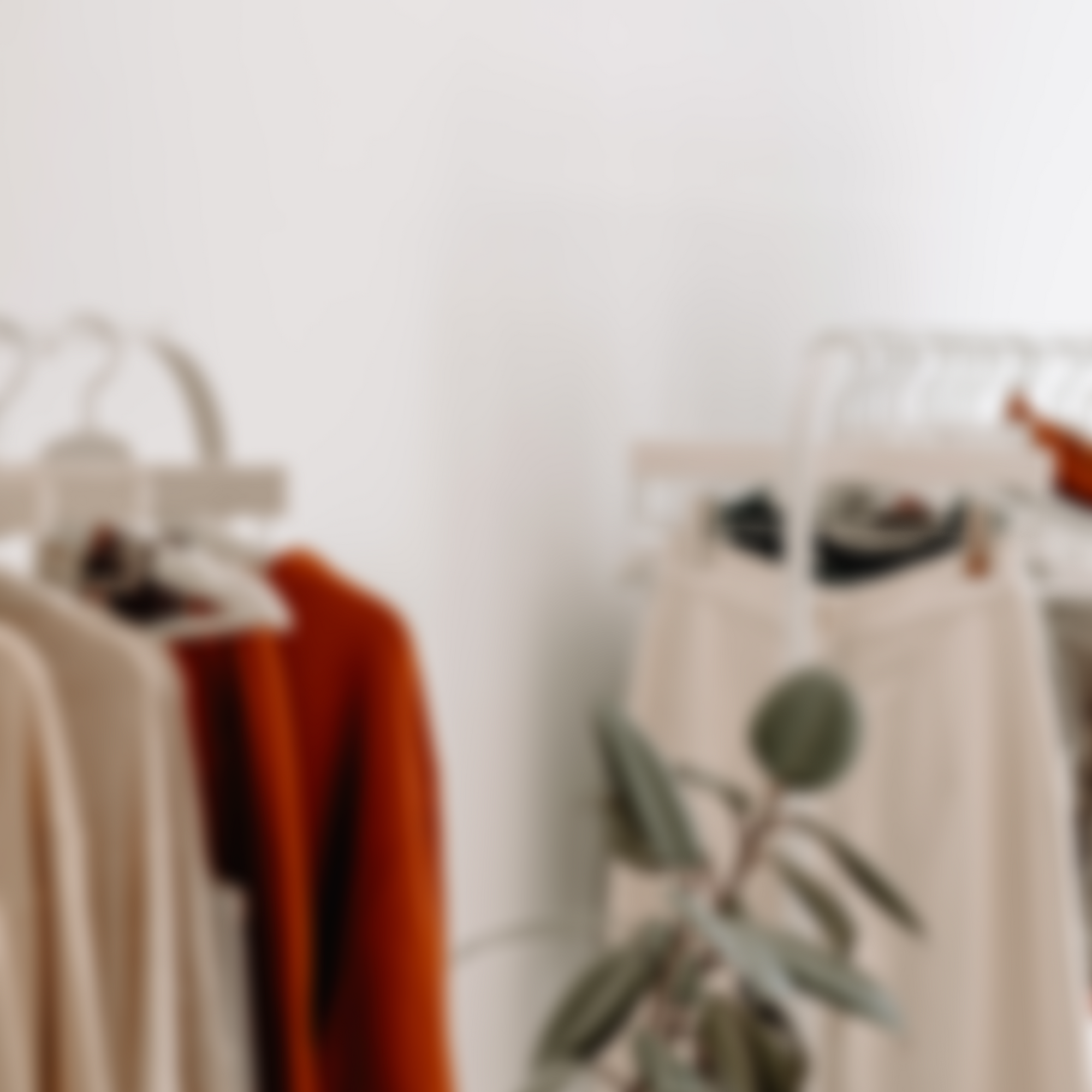 blurred image of hanging clothes; 